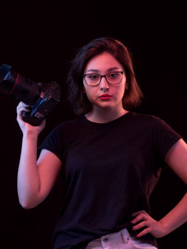 young-woman-black-t-shirt-with-camera